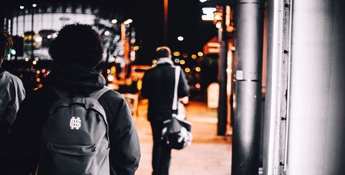 Woman standing at night