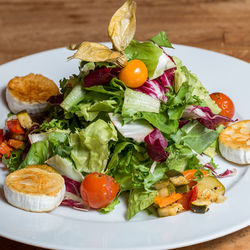 High angle view of fruits in plate on table