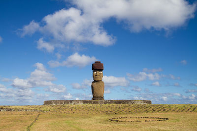 Built structure on field against sky