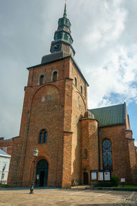 Low angle view of historic building against sky