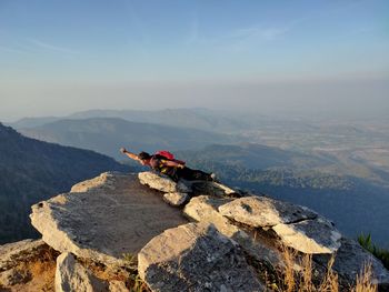 Scenic view of rocks on mountain against sky