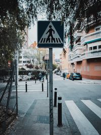 Road sign on street in city