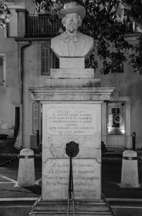 View of statue against historic building