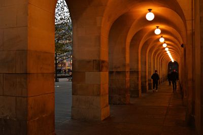Illuminated corridor of building