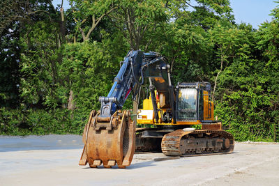 Construction site by road in city