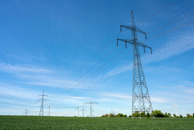 Overhead power lines in an agricultural area seen in germany