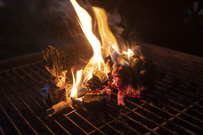 High angle view of bonfire on barbecue grill