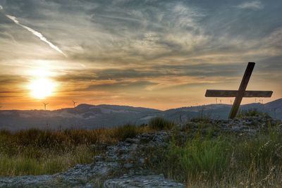 Scenic view of landscape against sky during sunset