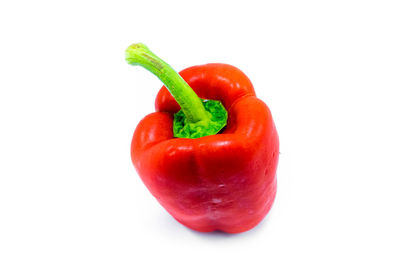Close-up of bell peppers against white background