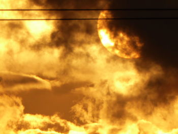 Low angle view of clouds in sky during sunset