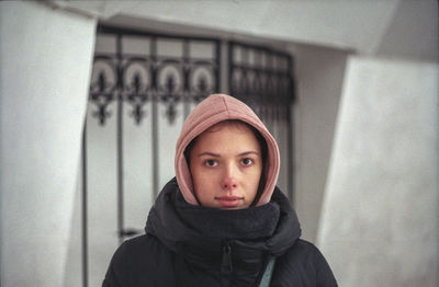 Portrait of young woman wearing hoodie