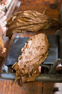 Close-up of dry leaves on table