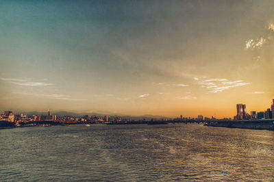 Scenic view of sea at sunset