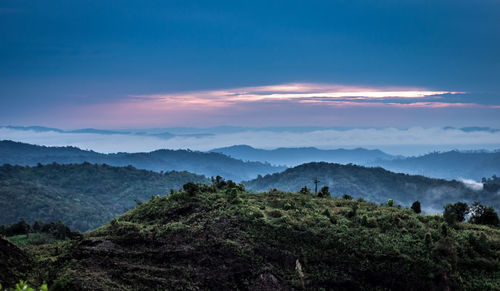 Scenic view of landscape against sky during sunset