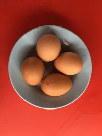High angle view of eggs in plate