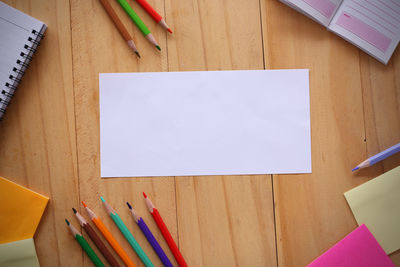 High angle view of colored pencils on table