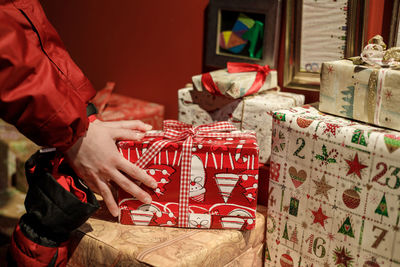 Midsection of woman holding gift box