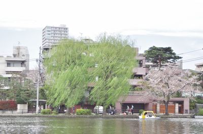Buildings in city against sky