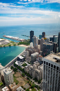 High angle view of city against cloudy sky