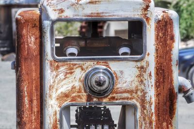 Close-up of rusty gas tank looks like face