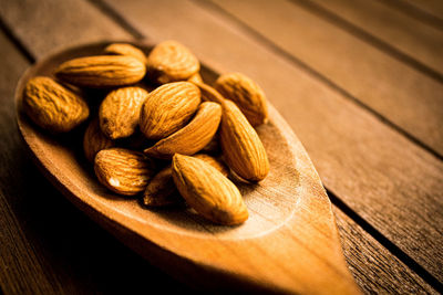 Close-up of roasted coffee beans on table