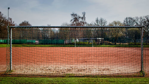 View of field with house in background