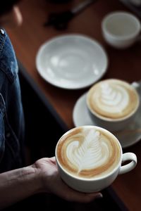 Close-up of coffee cup on table