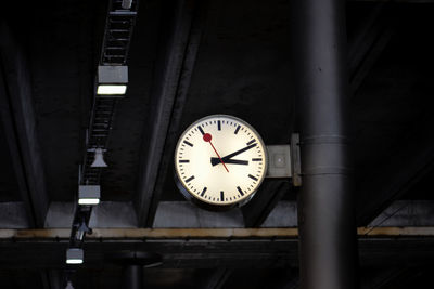 Low angle view of illuminated clock