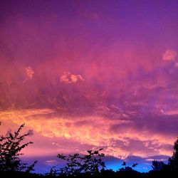 Low angle view of dramatic sky at sunset