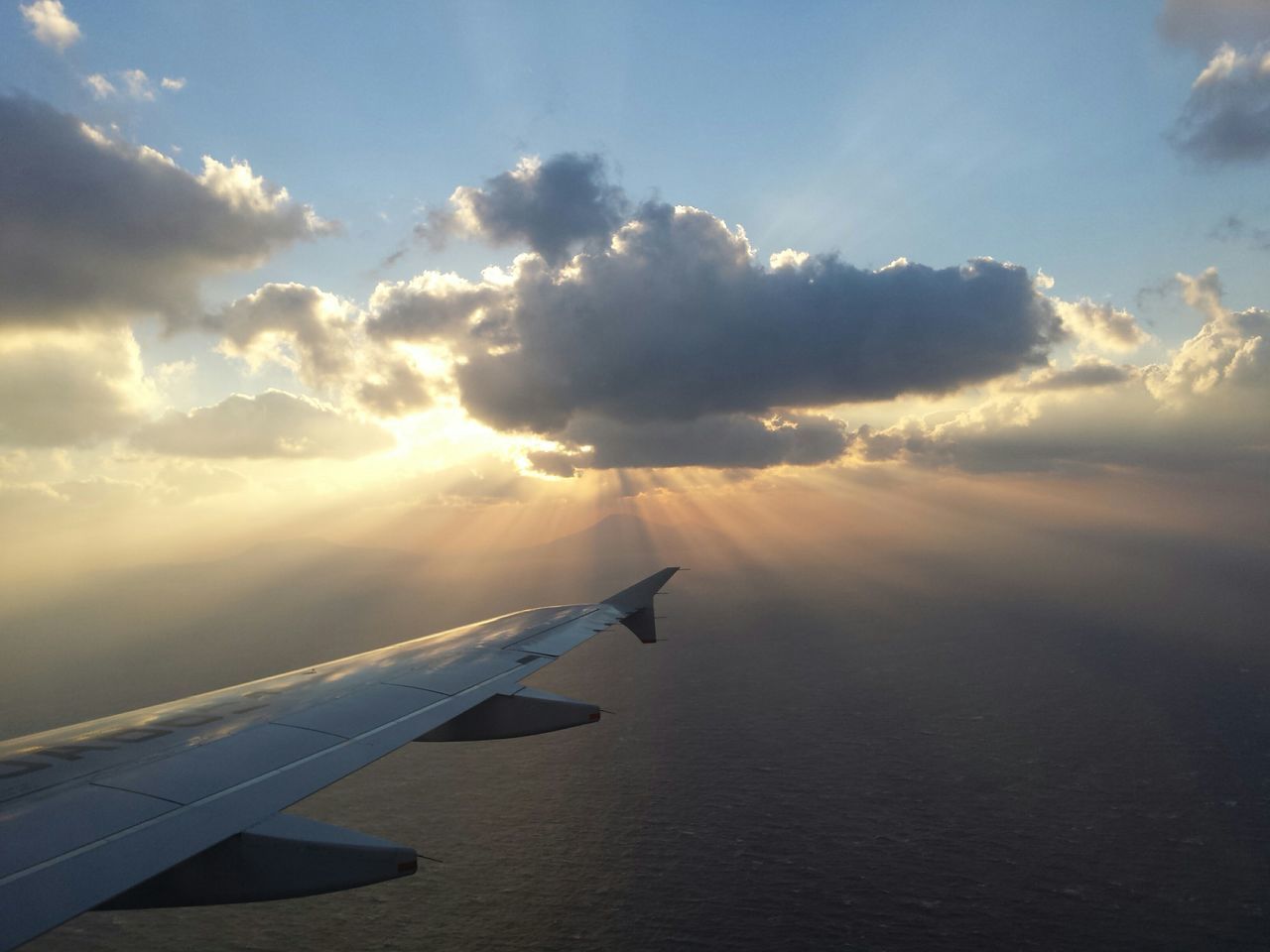 AIRPLANE FLYING IN SKY