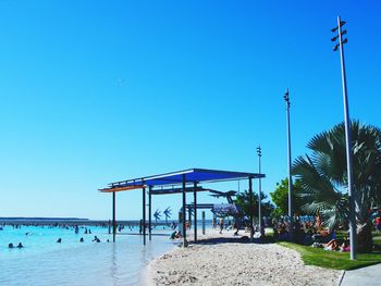 View of street light against blue sky