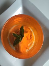 Ice cream in bowl with mint