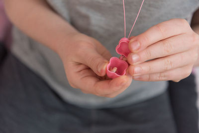 Close-up of woman holding hands