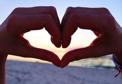 Close-up of heart shape against sky