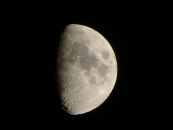 Low angle view of moon against sky at night