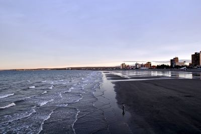 View of beach against sky during sunset