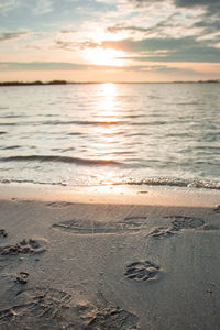 Scenic view of sea against sky during sunset