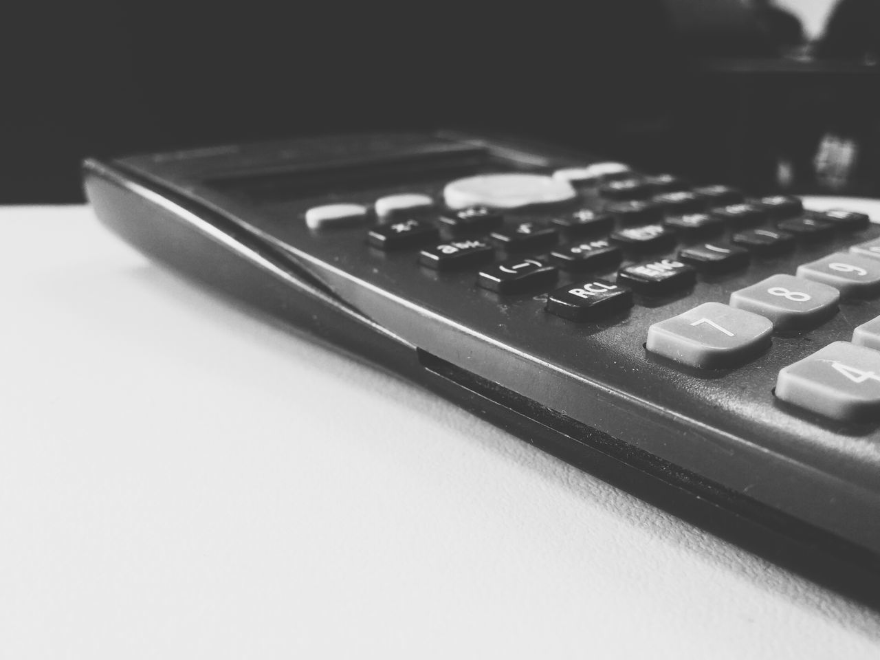 indoors, still life, table, close-up, technology, high angle view, selective focus, communication, connection, arts culture and entertainment, no people, wireless technology, computer keyboard, laptop, music, large group of objects, number, desk, studio shot, pen