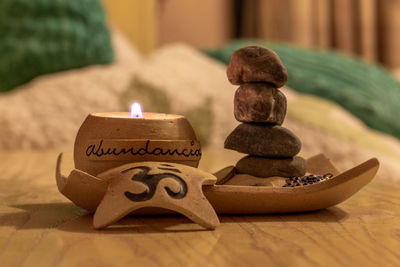 Close-up of candles on table