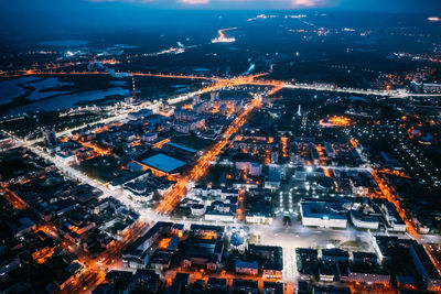 High angle view of illuminated cityscape at night