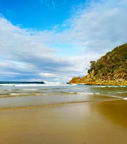 Scenic view of beach against sky