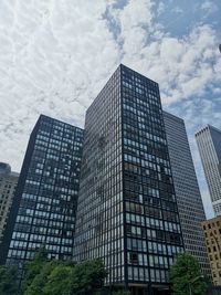 Low angle view of modern buildings against sky