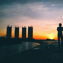 Silhouette of people at sunset