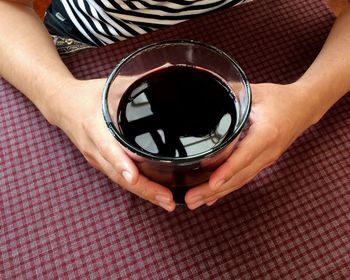 Close-up of woman hand holding drink