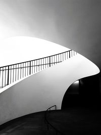 Staircase in modern building against sky