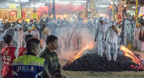 Panoramic view of crowd at night