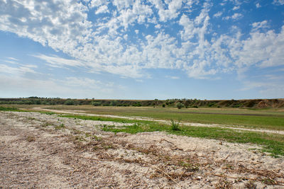 View from the shore of the steppe panorama and blue sky with clouds. kherson region, the 