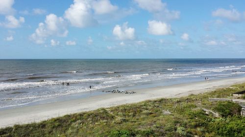 Scenic view of beach against sky