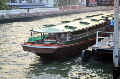 Boat moored in river