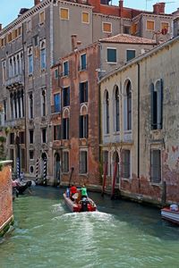 Boat in canal, everyday scene in venice